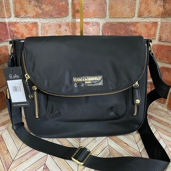 Handbags - NWT Perfect travel bag or everyday bag! Great quality.